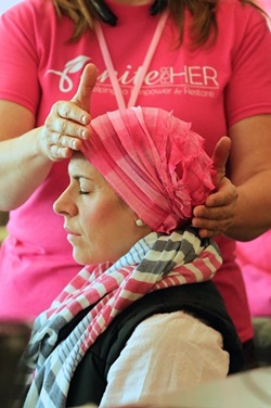 woman holding another womans head